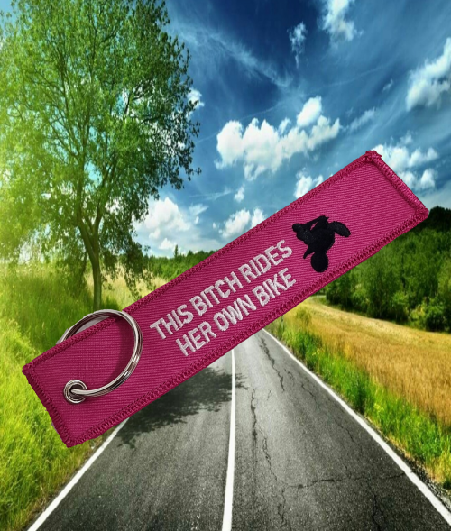 This Bitch Rides Her Own Bike (Pink) – Keyring,female riders, lady biker, biker chick, girl keyring, biker, motorbike, motorcycle keyring
